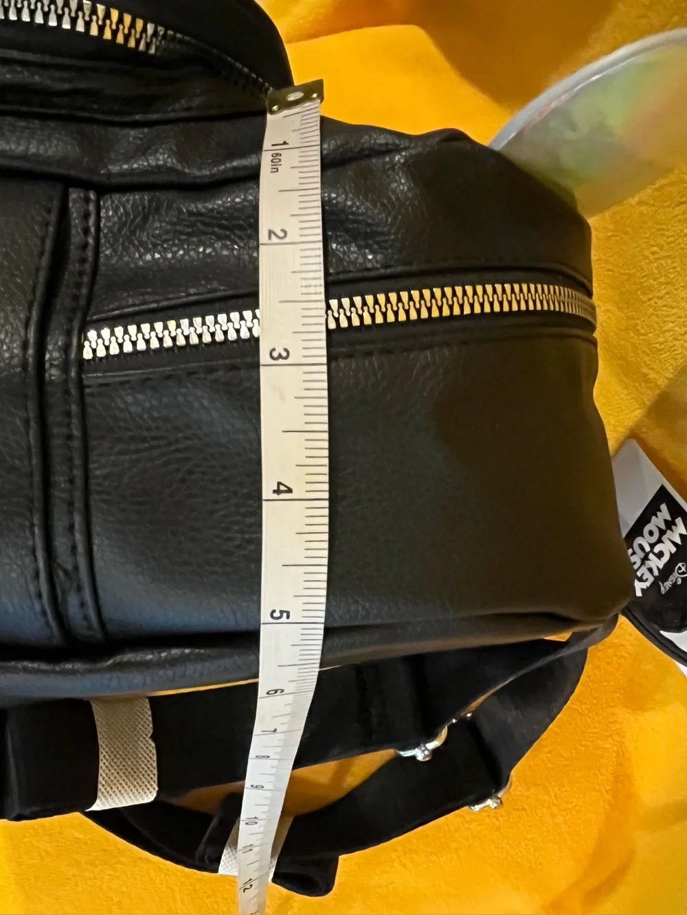 Disney Mickey Mouse black faux leather Mini Backpack w/ holographic details. NWT